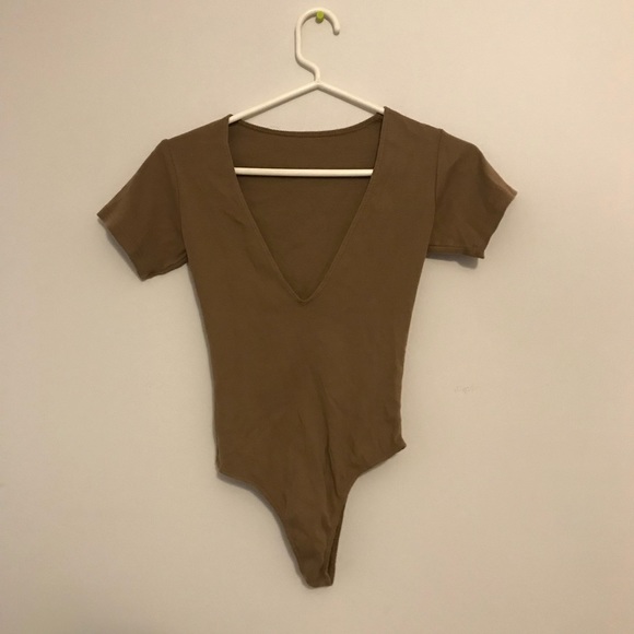 Brandy Melville Tops - Brandy Melville body suit.